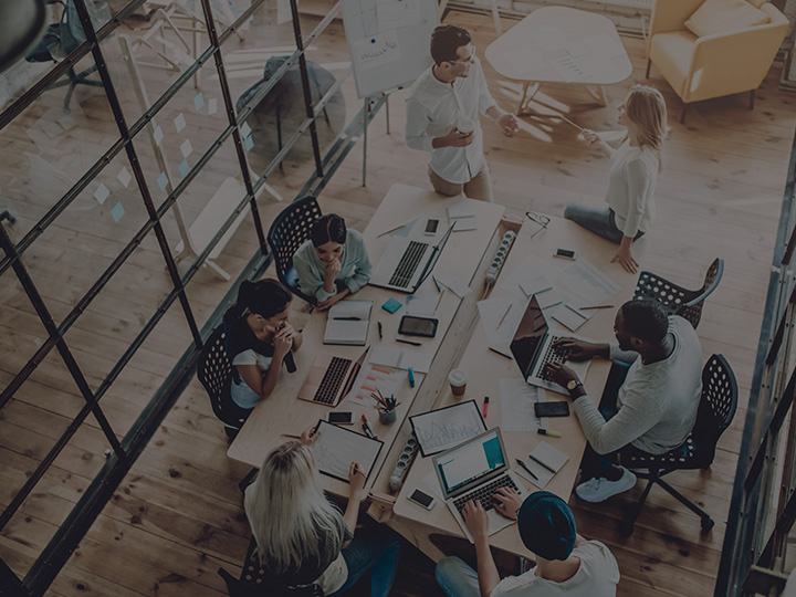 Nossa filosofia overhead office shot